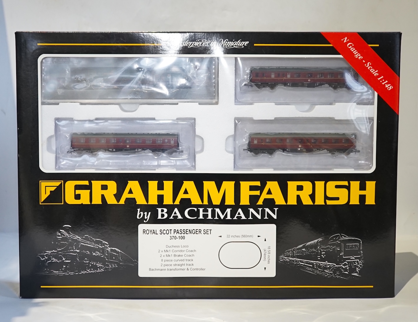 Four boxed Graham Farish N gauge railway train sets; a Royal Mail set, comprising a Class 47 diesel locomotive and three coaches (370-125), together with a Queen Elizabeth Golden Jubilee set comprising a Coronation Class